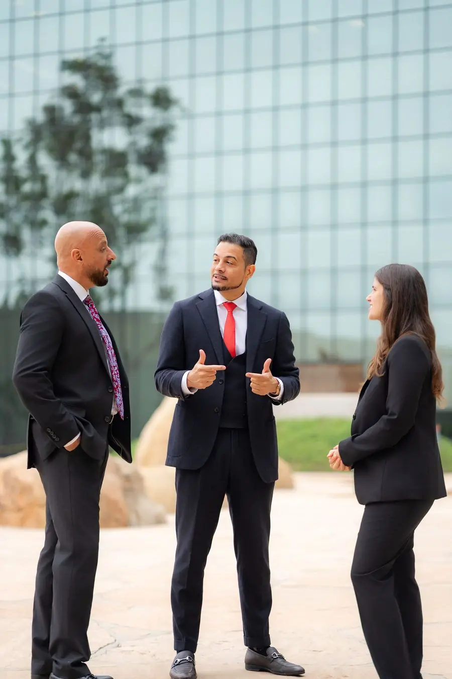 Jonathan P. LaCour, Lisa Noveck and Rony Barsoum in conversation outside the office